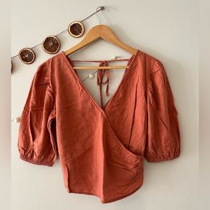 Burnt orange linen cross top. Excellent condition.